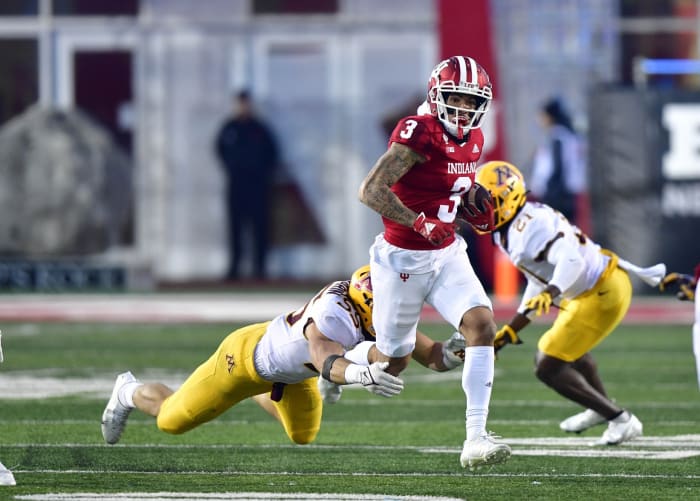 Nov 20, 2021; Bloomington, Indiana, USA; Indiana Hoosiers wide receiver Ty Fryfogle (3) is tackled by Minnesota Golden Gophers linebacker Mariano Sori-Marin (55) during the second half at Memorial Stadium. Gophers won 35-14. Mandatory Credit: Marc Lebryk-USA TODAY Sports